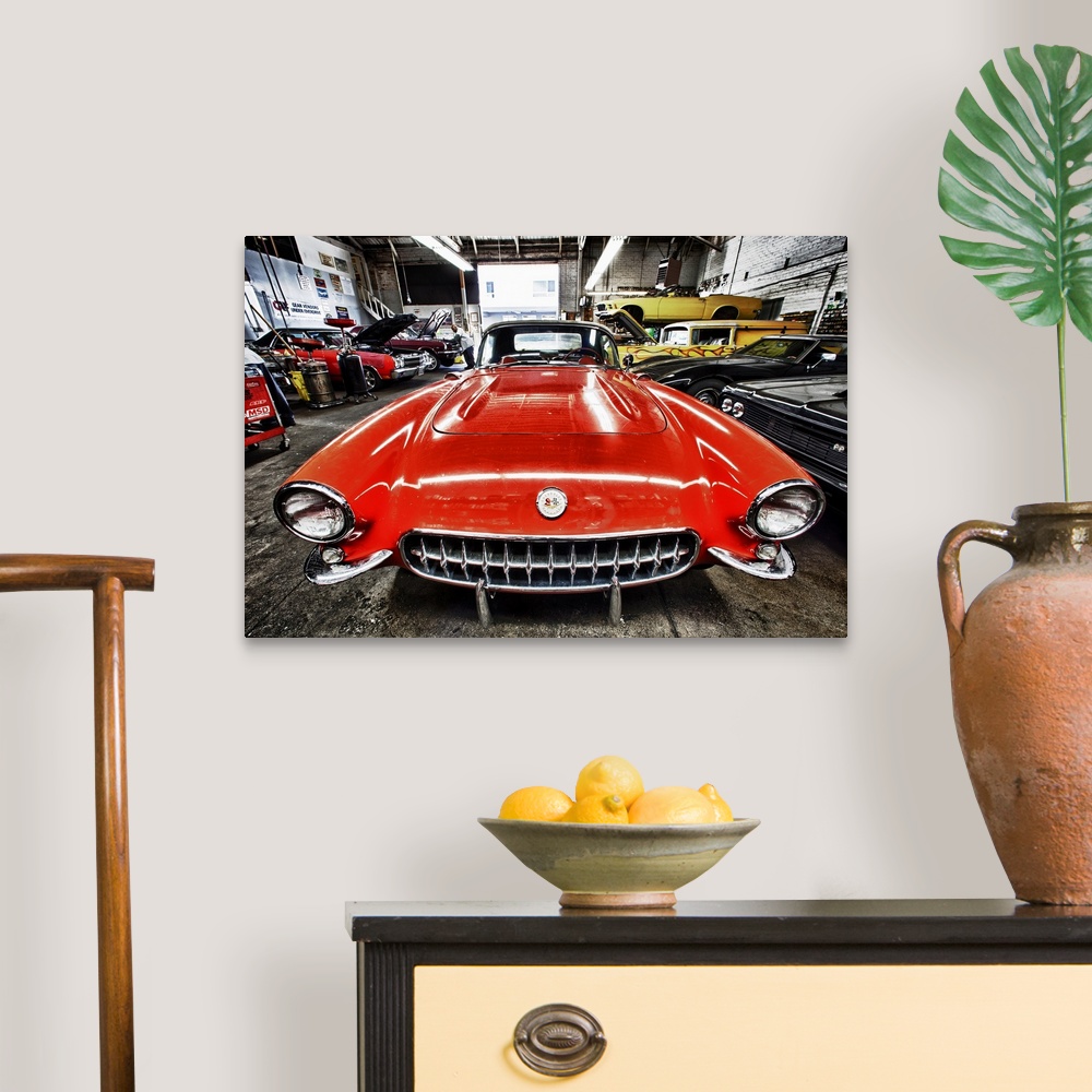 Classic red corvette in a car repair Canvas Wall Art Print, Sports Car